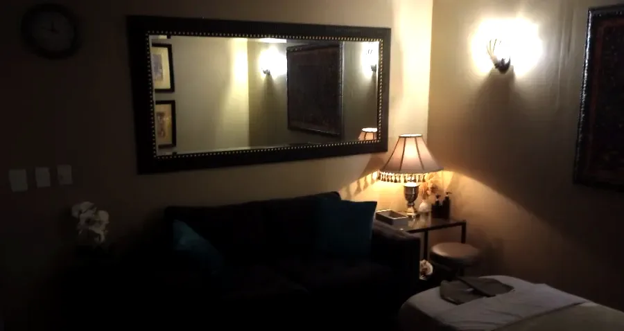 Warm, candlelit treatment room